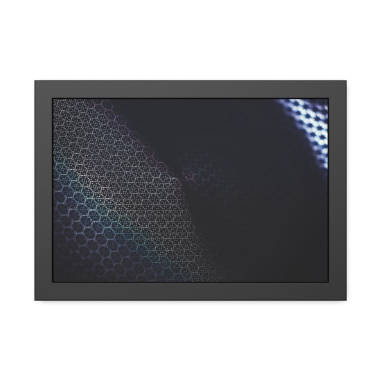 Futuristic abstract design with a dark geometric hexagonal pattern and creative color gradients.