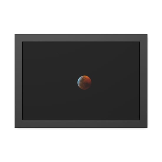 Captivating view of the blood moon during a total lunar eclipse against the night sky.