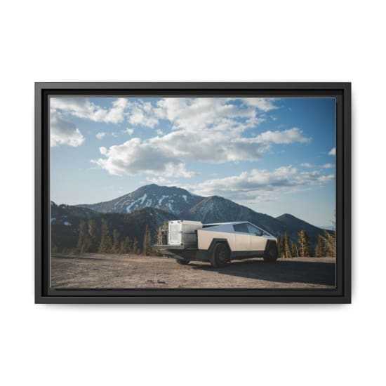 Tesla Cybertruck parked on mountain overlook against a breathtaking landscape. Perfect blend of technology and nature.