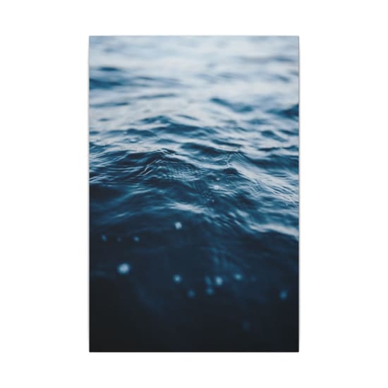 Peaceful ocean waves captured at dusk, showcasing the tranquility of nature.