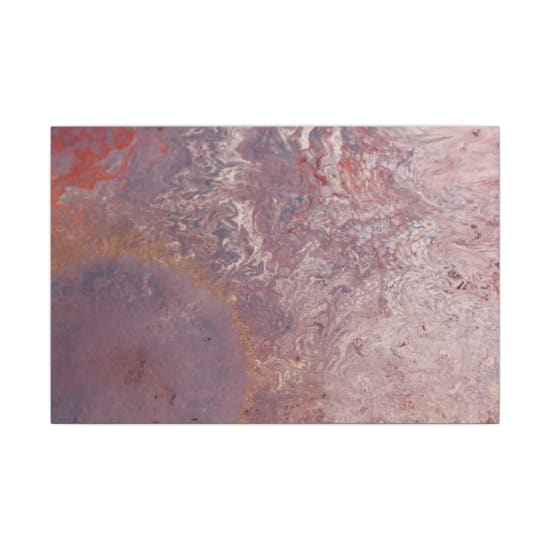 Detailed close-up of a marbled surface showcasing swirling colors and textures.