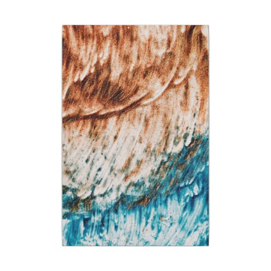 Closeup of picture of sea and ground made of blue and brown dye