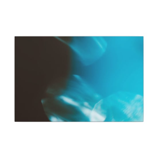 A captivating abstract image showcasing blue motion blur with dynamic artistic elements.