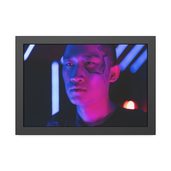 Cyberpunk-themed portrait of a man in neon lighting, showcasing a futuristic face tattoo.
