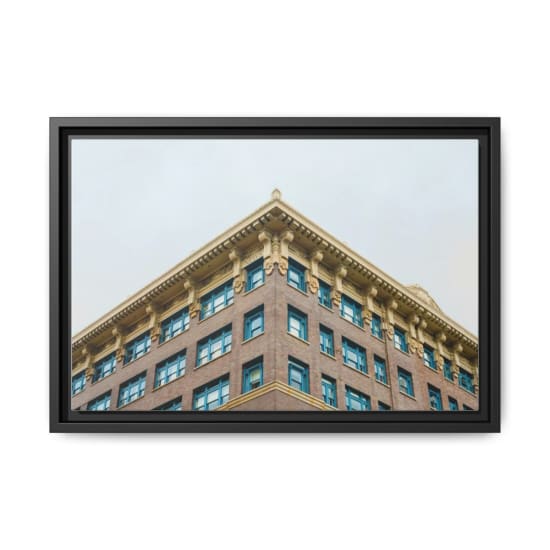 Low angle view of a classic multi-storey building showcasing vintage architecture in Tacoma, WA.