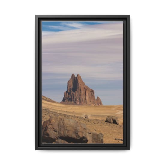 Stunning view of Shiprock, a towering rock formation in the arid New Mexico desert.