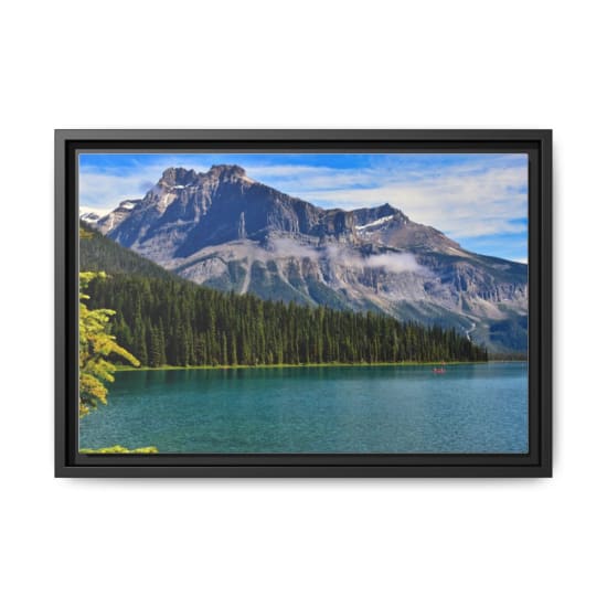 Breathtaking view of the Canadian Rockies and Emerald Lake in BC, Canada, capturing serene nature and vibrant scenery.