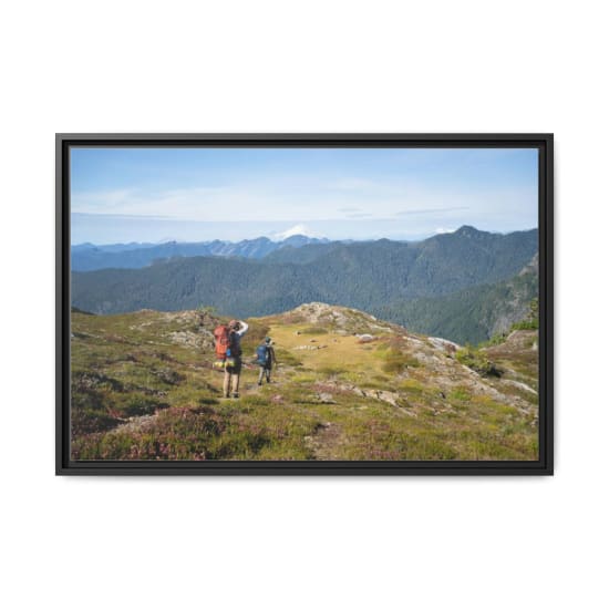 Hikers explore a scenic trail in the mountains near Darrington, Washington, offering breathtaking views.