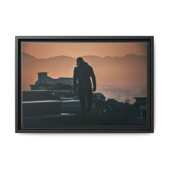 Silhouette of a backpacker exploring ruins at sunset in Kabul, Afghanistan.