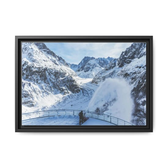 Breathtaking view of snow-covered mountains and glacier from a scenic viewpoint.