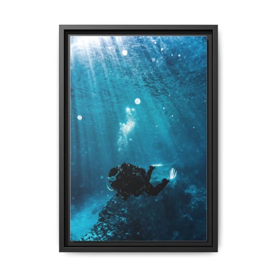 Scuba diver exploring underwater reef in vibrant turquoise waters, capturing marine life beauty.