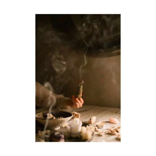 A serene ritual scene showcasing burning incense and candles, creating a mysterious and mystical atmosphere.