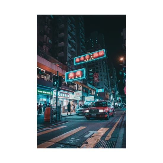 Explore the bustling nightlife of Kowloon, Hong Kong with neon lights and city life.