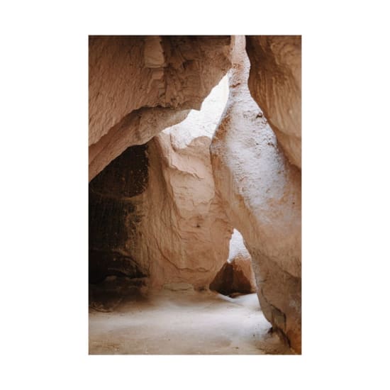 Explore the beauty of naturally eroded rock formations in a serene desert setting.