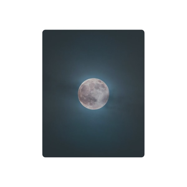 Stunning full moon shining brightly against a clear night sky, captured in Colorado, USA.