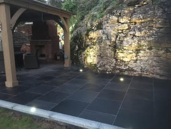 black limestone paving garden