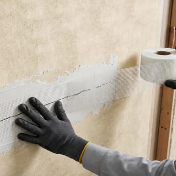applying 100mm scrim tape