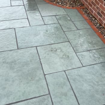 blue limestone paving garden patio wet