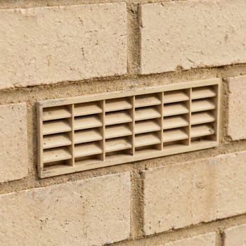 buff plastic air brick in a wall
