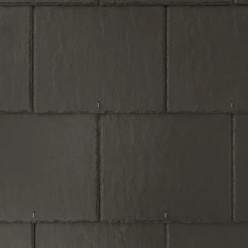 close up of textured graphite fibre cement slate roof tile 600mmx300mm