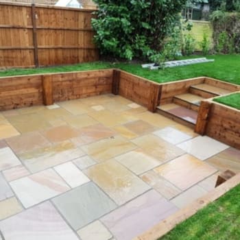 warm buff indian sandstone paving garden patio