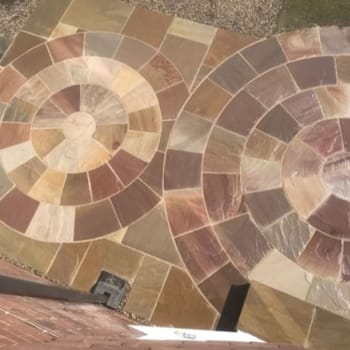 warm buff indian sandstone paving patio