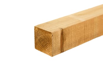 angled view of 4x4 green treated square top fence post