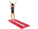 Girl on balance beam mat