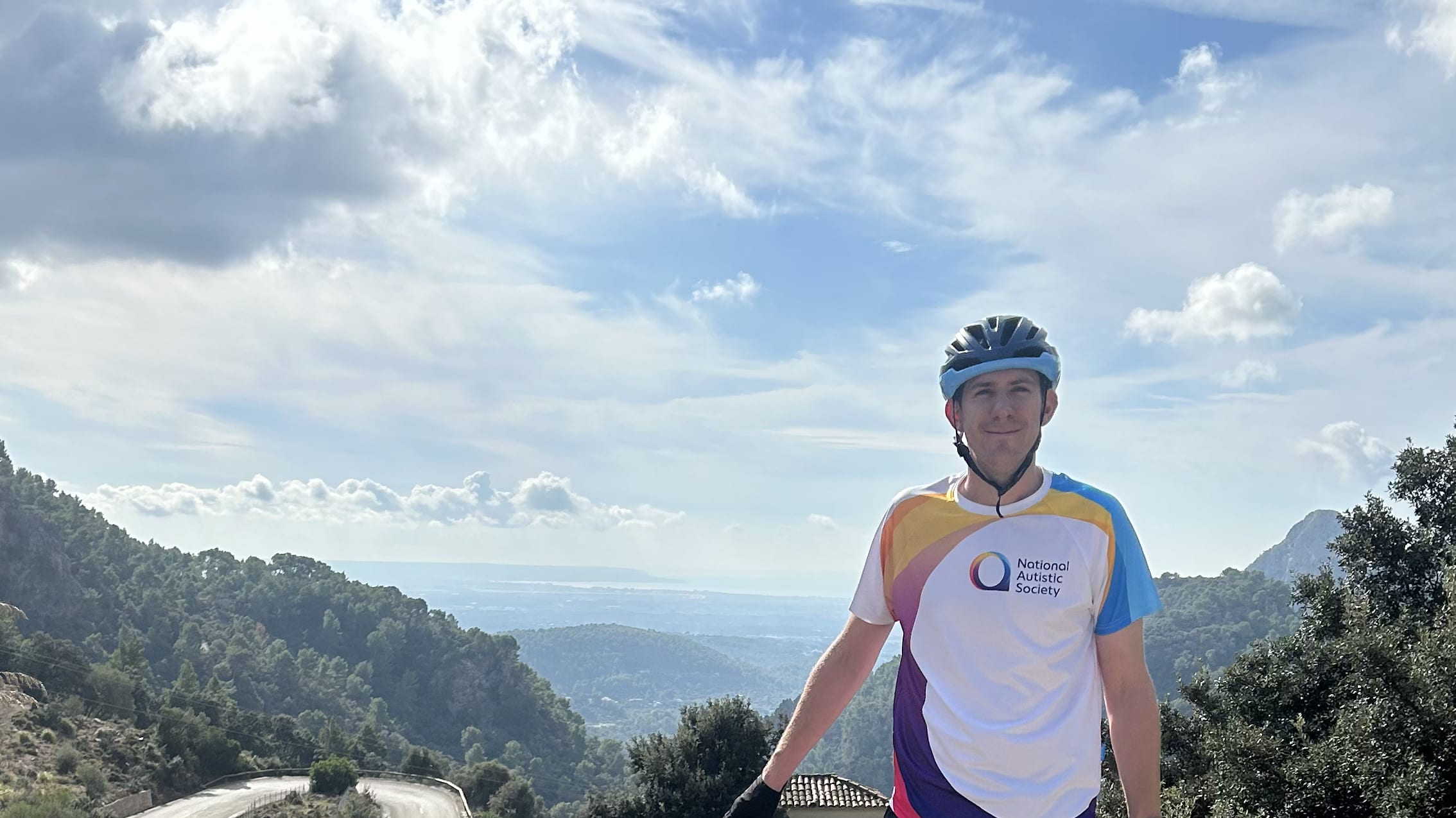 Matt on a bike at the top of Coll de Soller in Mallorca