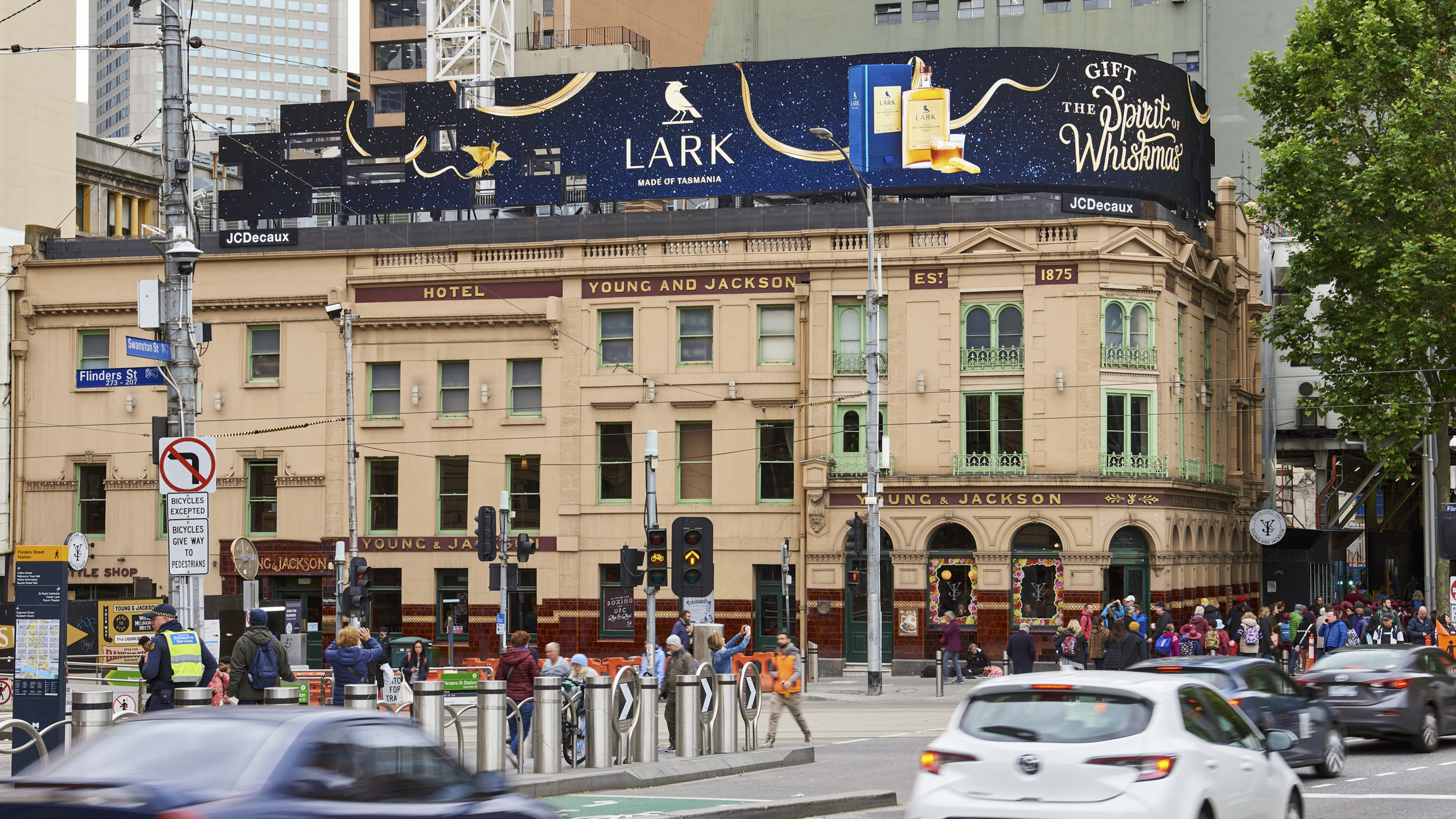 LARK outdoor advertising campaign on the Swanston billboard in Melbourne booked by MAXCo.LAB.