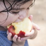 Enjoying an apple