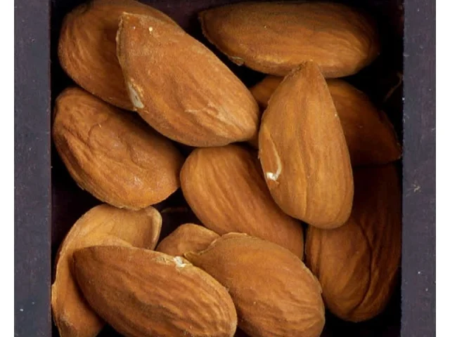 Τσουρεκάκια με γλυκό του κουταλιού κι αμύγδαλα recipe