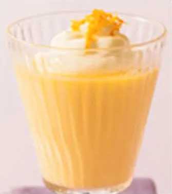 ατομικά τσίζκεϊκ εσπεριδοειδών στο ποτήρι