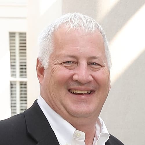 Picture of smiling Director, M.S. in Global Commerce Program, Jim Burroughs.