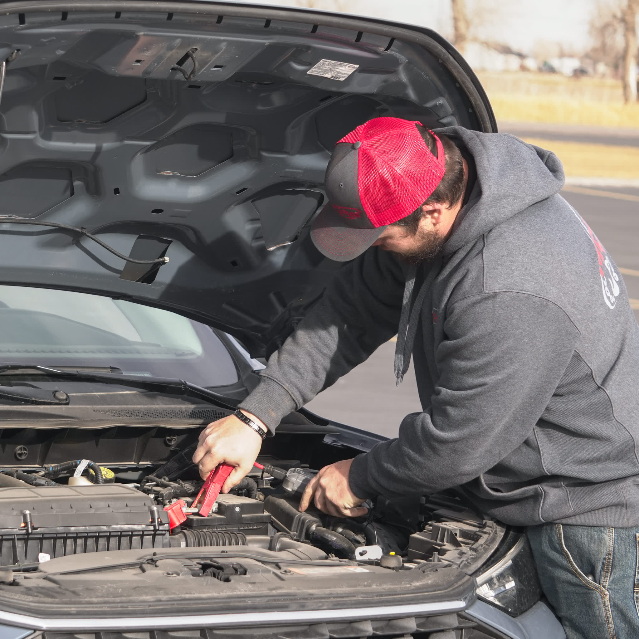 McRae Towing & Recovery roadside assistance jump start.