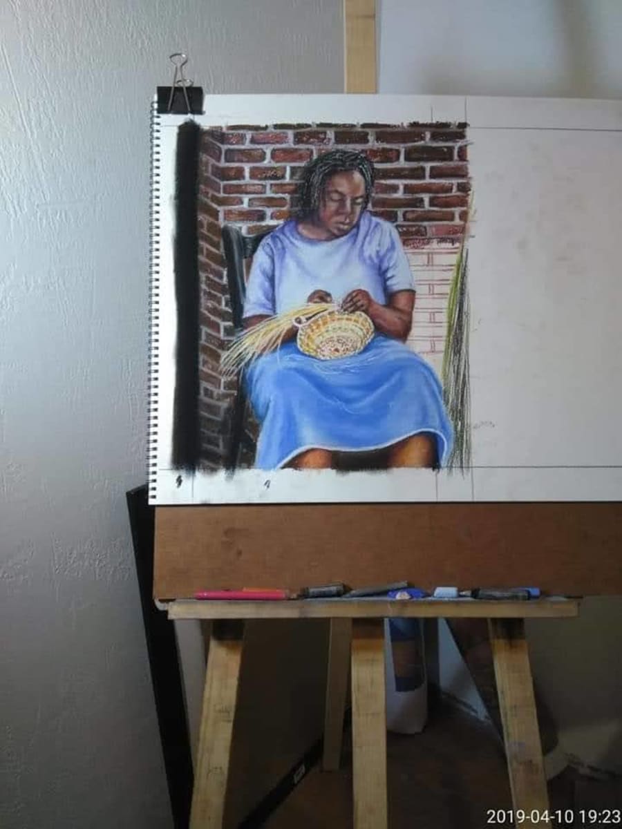A portrait in progress on the easel in Robert Atkins' studio