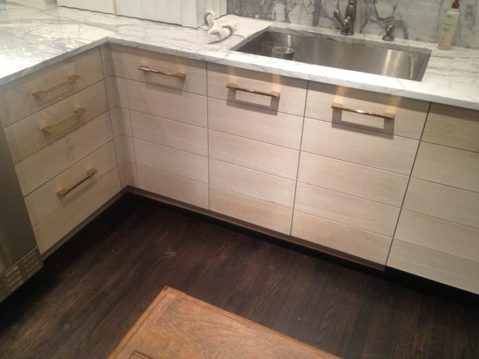 White Kitchen Cabinets with Gold Accents