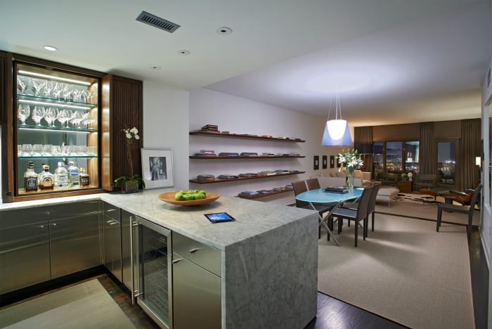 Modern Dining Area With Floating Bookshelves