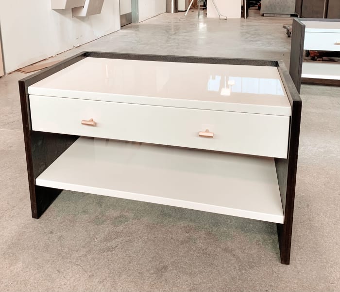 Glossy White Nightstand with Brass Pulls