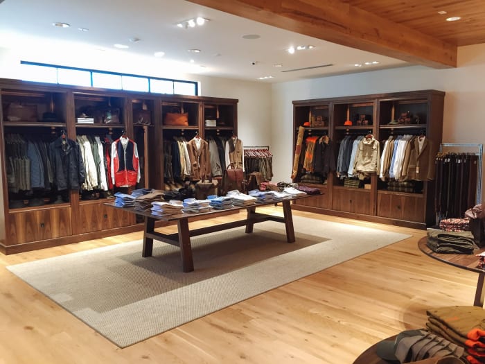Caliber Gun Store Clothing Racks