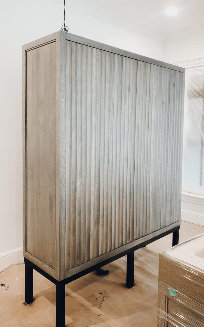 Fluted White Oak and Bronze Cabinet