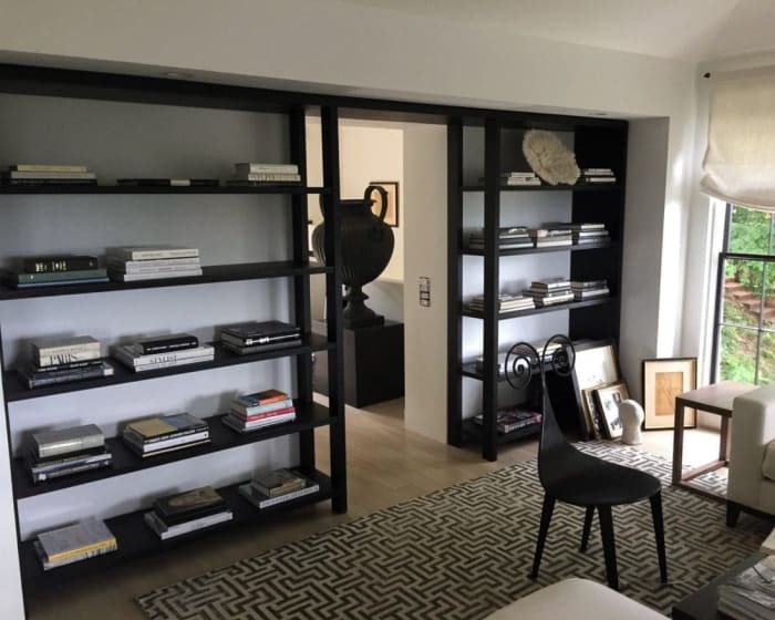 Streamline built in ebonized oak bookcases