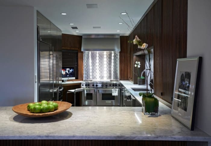 Fluted Walnut & Stainless Kitchen
