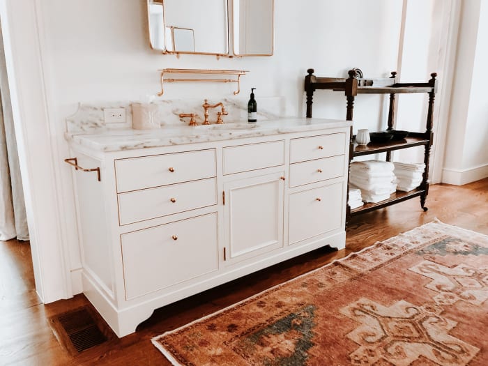 White Bathroom Vanity with Brass