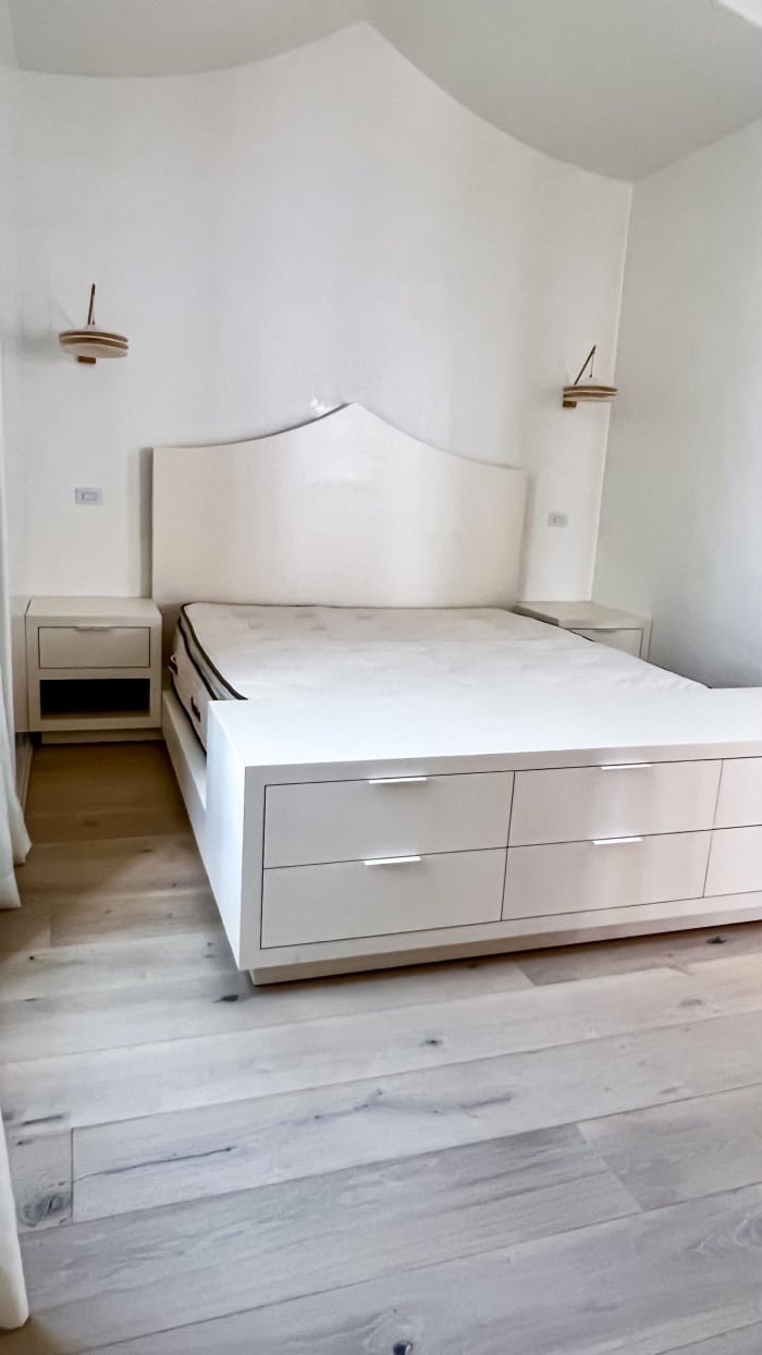 Crisp, White Bed Frame with Built In Credenza