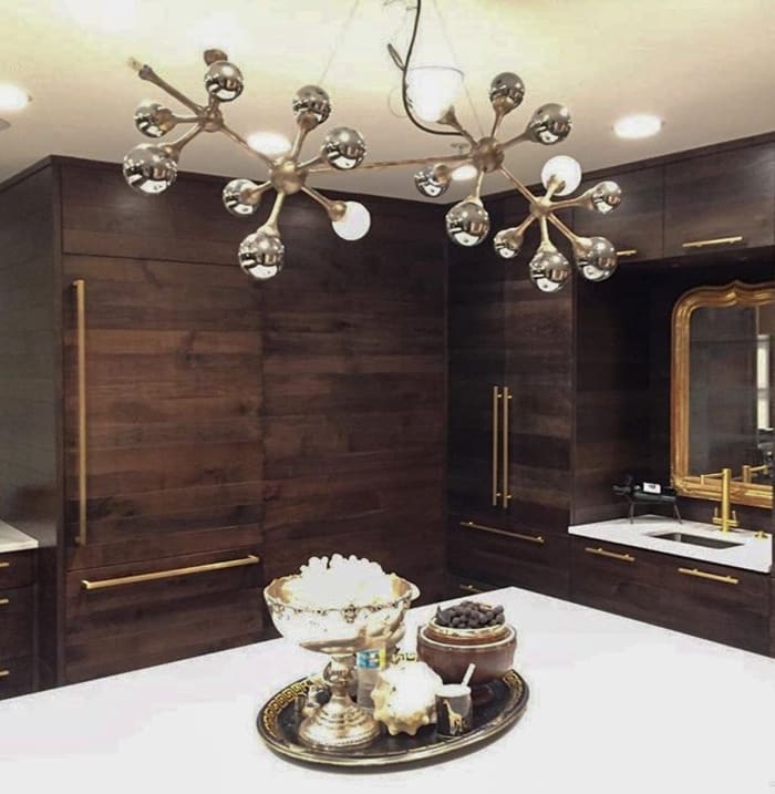 Walnut Kitchen Cabinets with Gold Accents