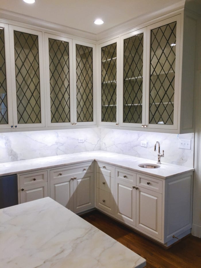 White Cabinets with Lattice Front