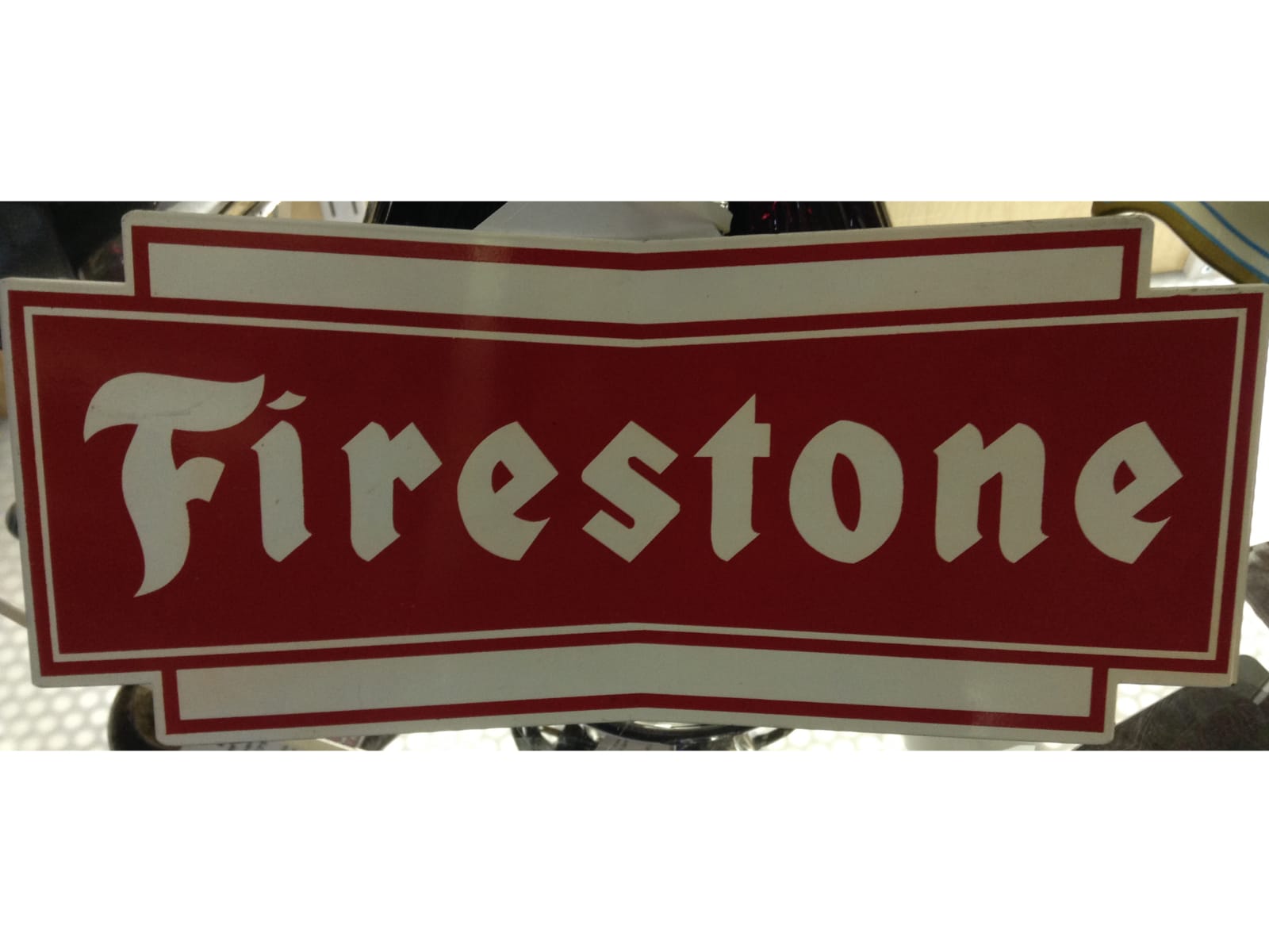 Firestone Tires Tin Sign at Anaheim 2013 as H52 Mecum Auctions
