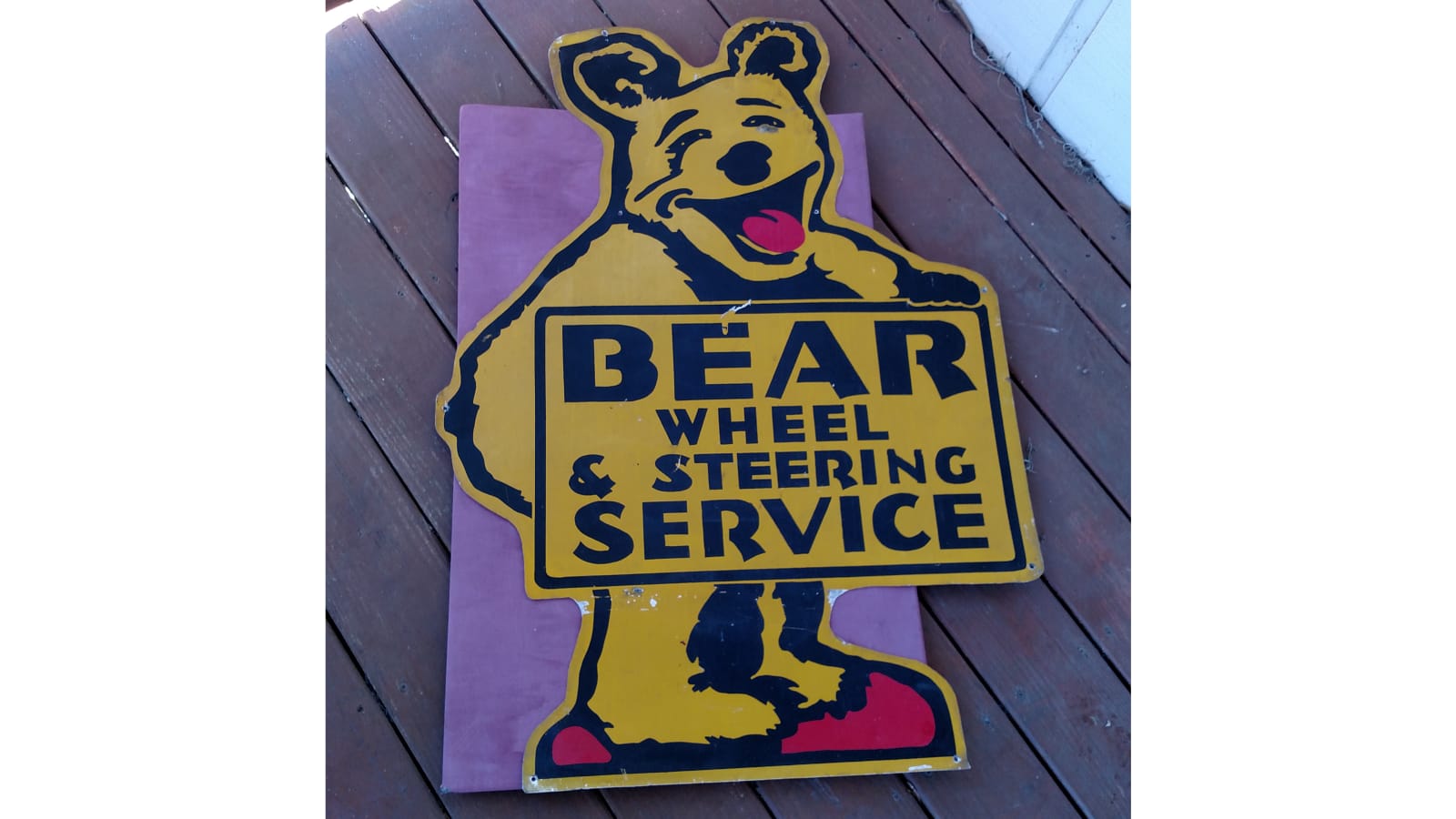 Bear Wheel And Steering Service Sign at Indy 2016 as K40 Mecum Auctions