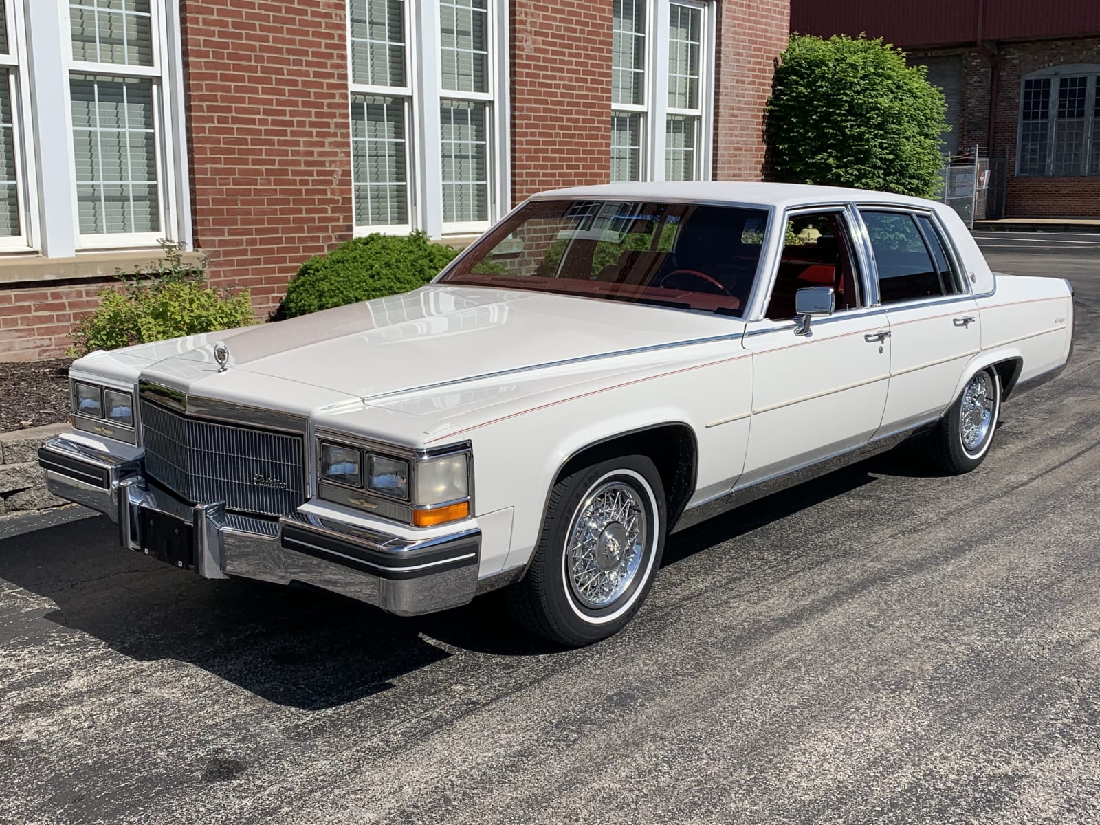 1984 Cadillac Fleetwood Brougham at Indy 2021 as W80 Mecum Auctions